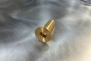 Reims electroerosion usinage de haute precision Vis speciale Bronze e1729615166846-300x201